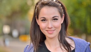 1 dark haired female tortures another during lezdom play in concrete cellar